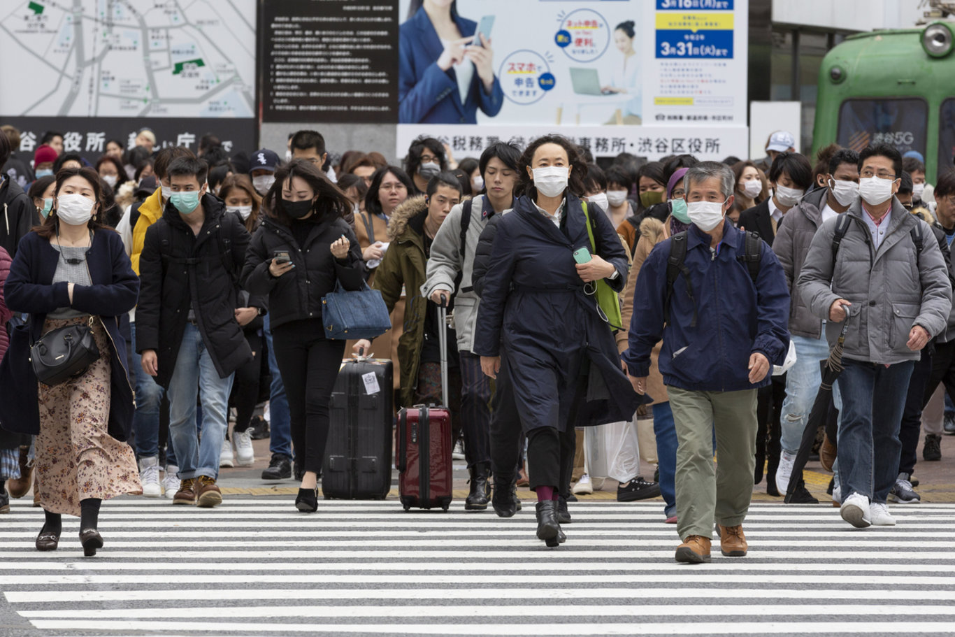 Maske yasağının kalkmasının ardından Japonlar gülmeyi unuttu!