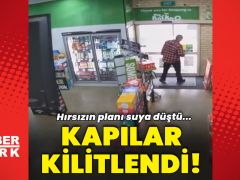 Marketin kapısının kilitli olduğunu gören hırsız böyle kaçtı